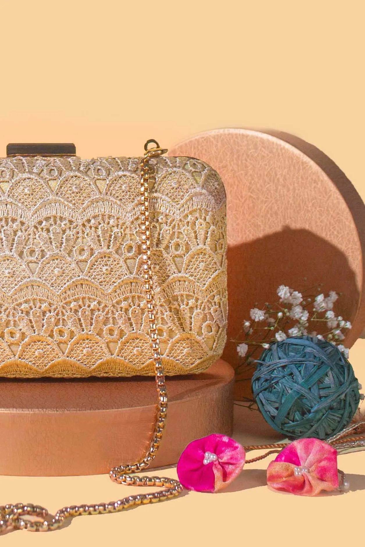 Gold cutwork box clutch