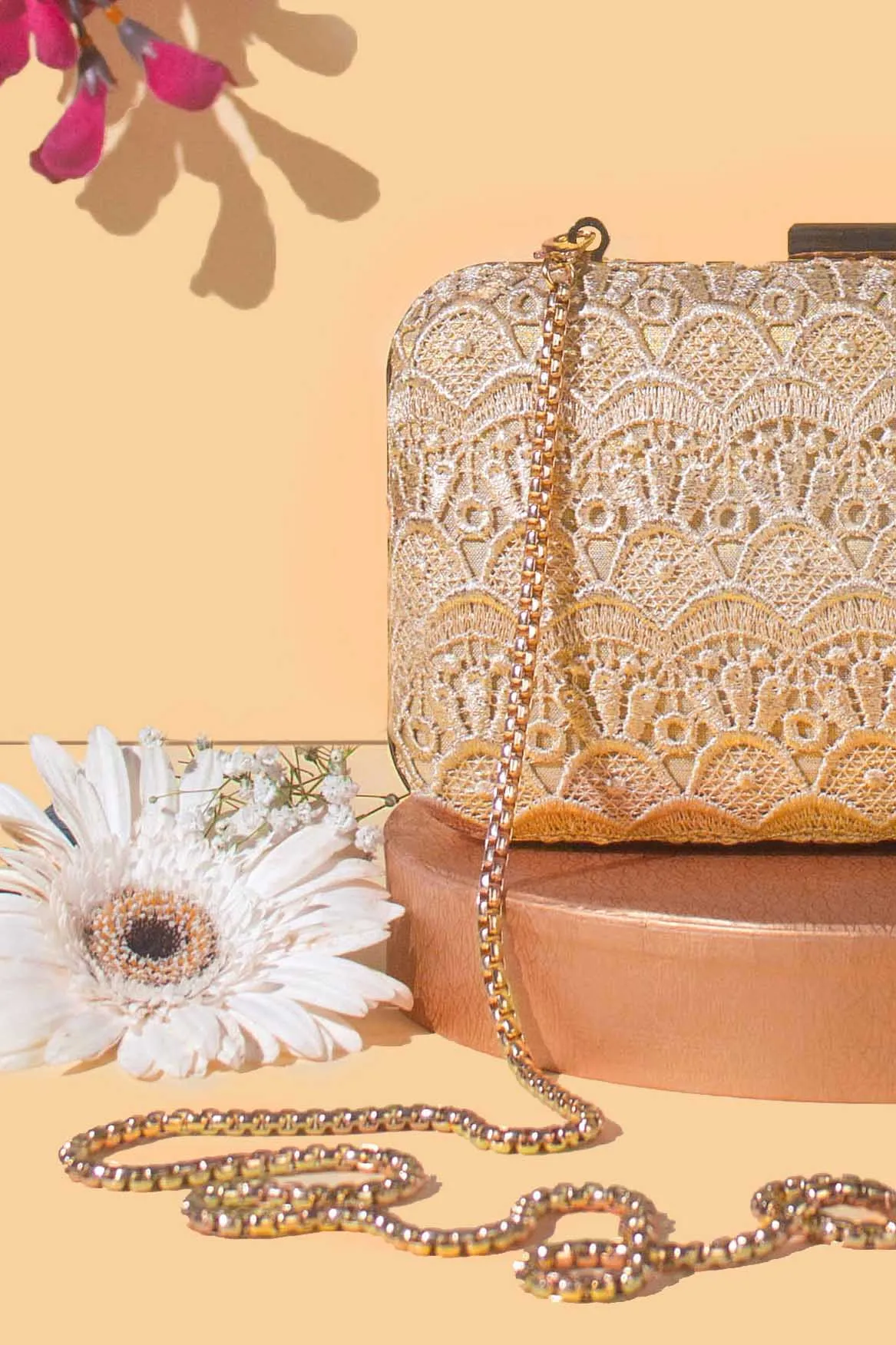 Gold cutwork box clutch