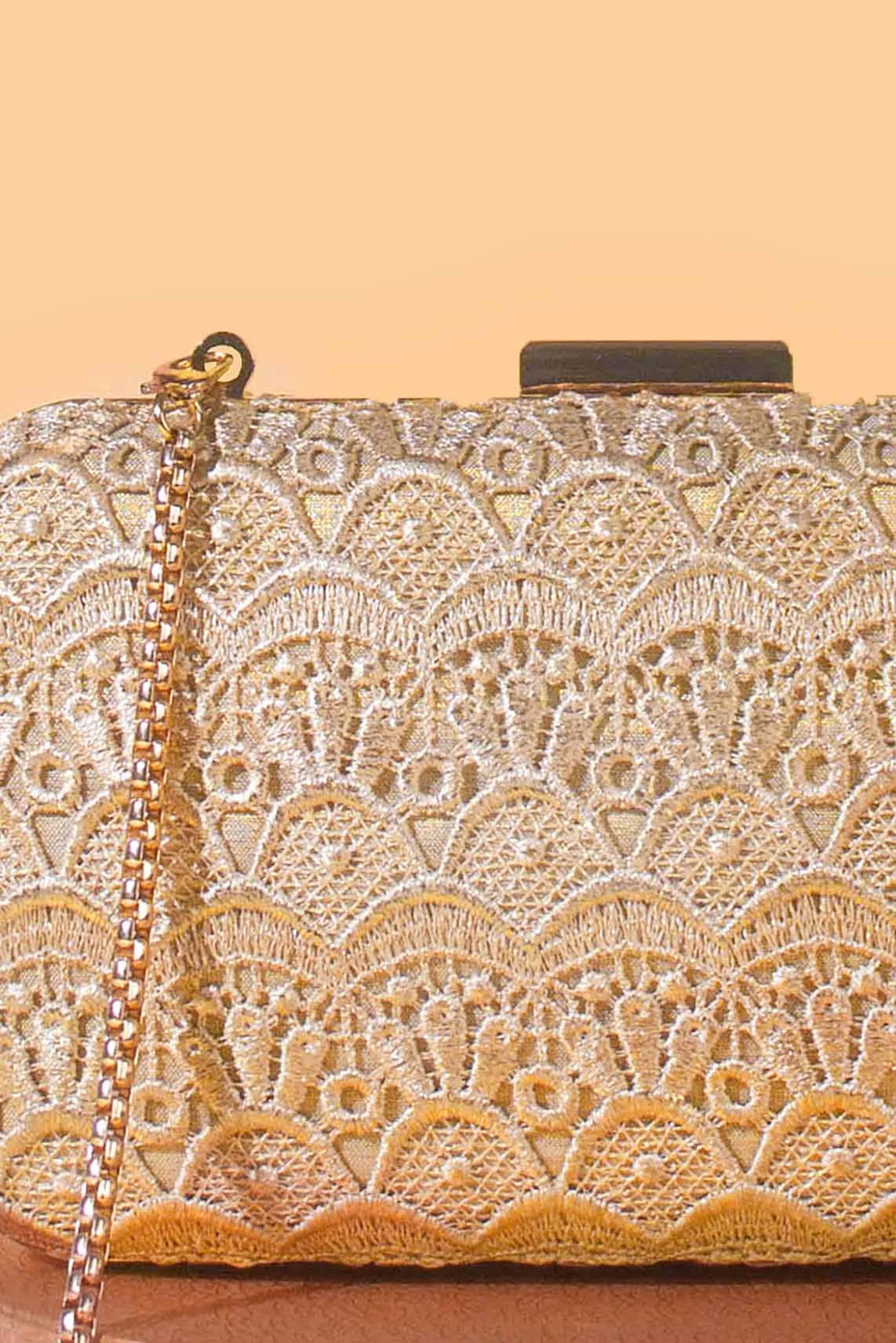 Gold cutwork box clutch